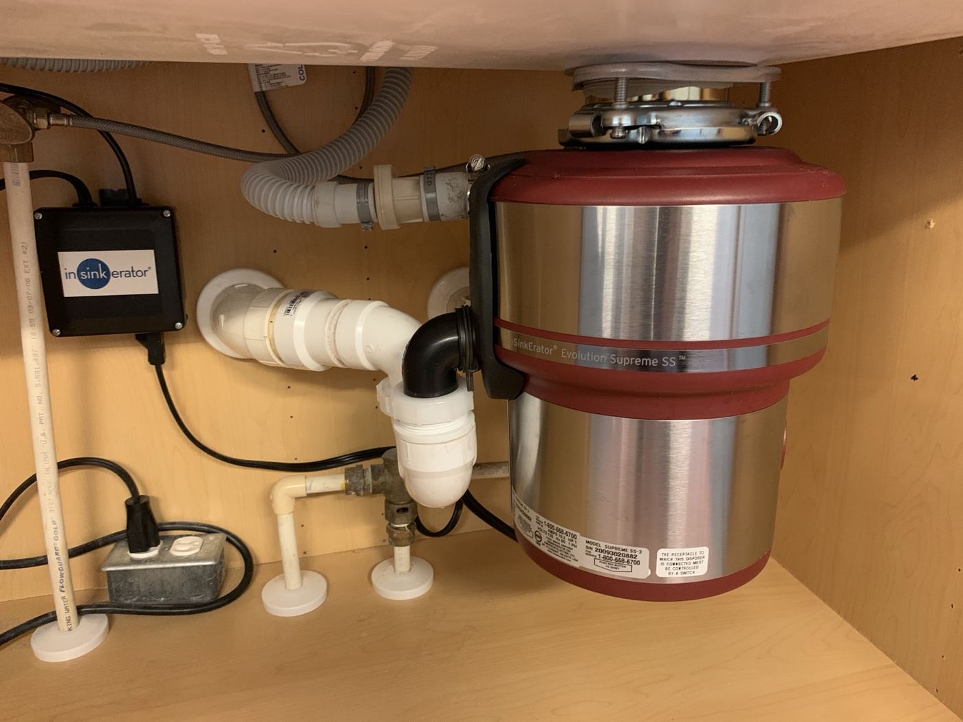 Garbage disposal and kitchen drain plumbing installation completed by Mercy's Plumbing